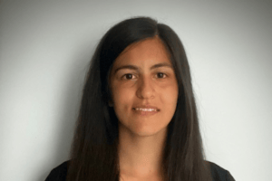 Ashleigh Gonsalves, Group Professional Lead for Therapies, looking at the camera.