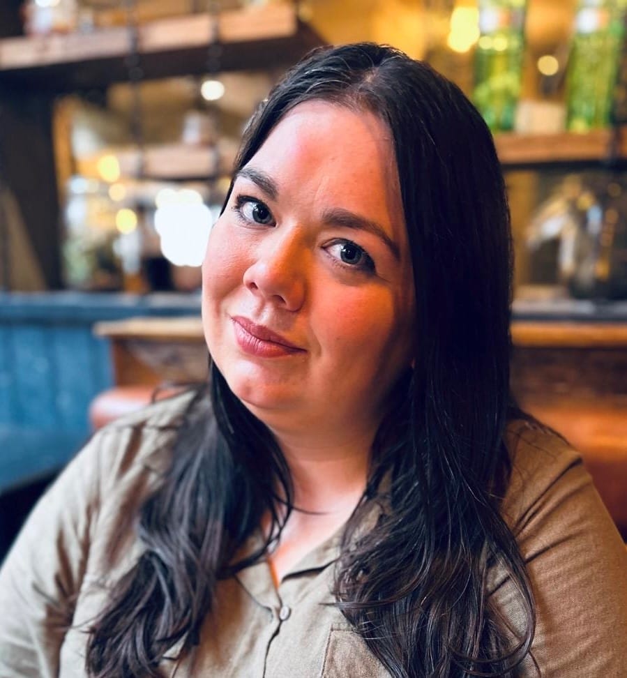 Rebecca looking at the camera.