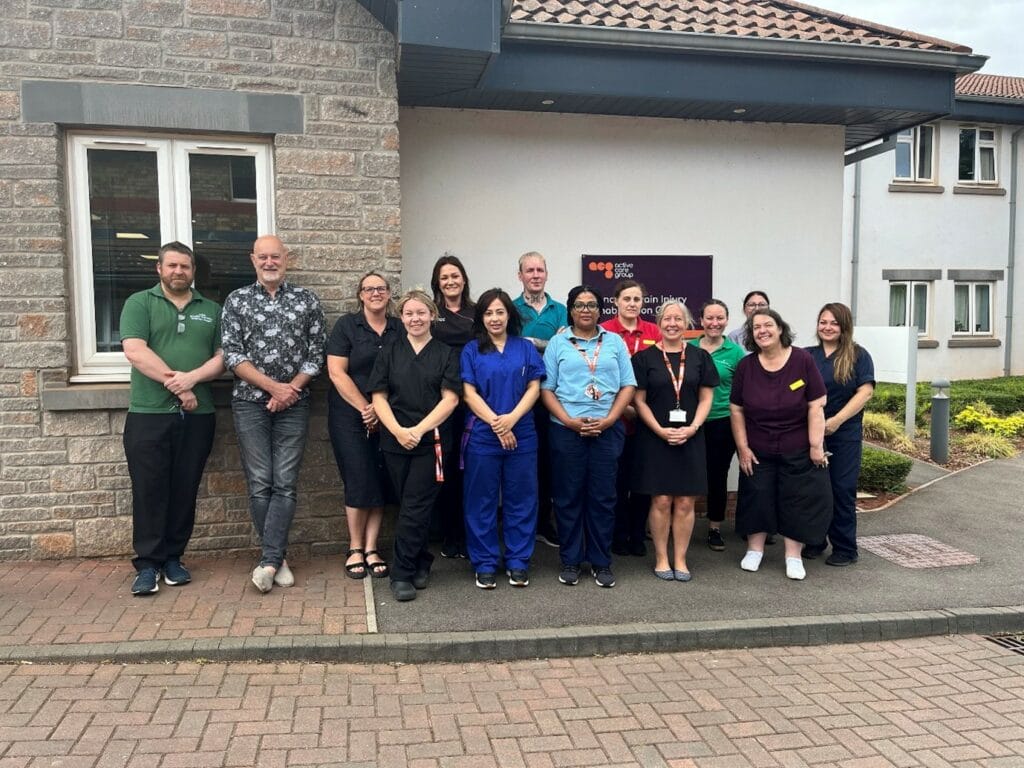 The team at Frenchay outside the building.